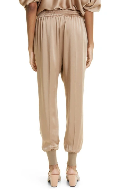 Shop Stella Mccartney Satin Joggers In 2802 Taupe