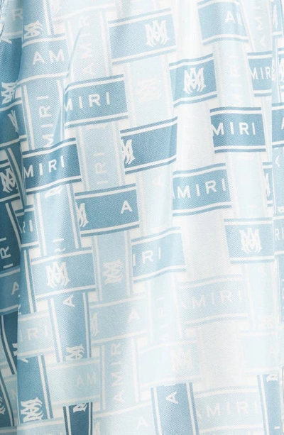 Shop Amiri Dégradé Logo Tape Print Silk Shorts In Blue