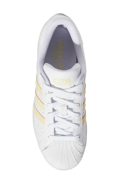 Shop Adidas Originals Superstar Sneaker In Ftwr White/ Easy Yellow