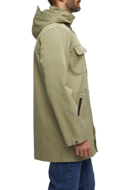Shop Bernardo Tech Water Resistant Raincoat In Olive Rust