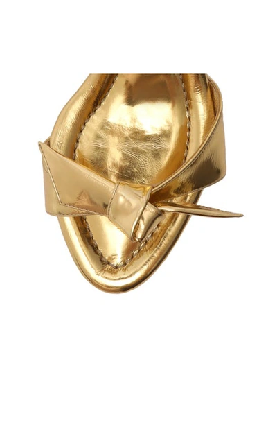 Shop Alexandre Birman Clarita Flare Metallic Leather Sandal In Golden