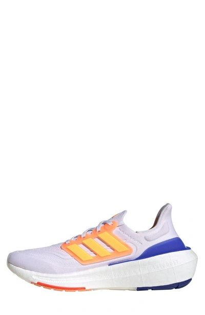 Shop Adidas Originals Ultraboost 23 Running Shoe In White/ Solar Gold/ Lucid Blue