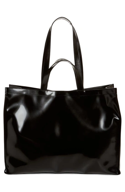 Shop Acne Studios Logo Embossed Faux Leather East/west Tote In Black