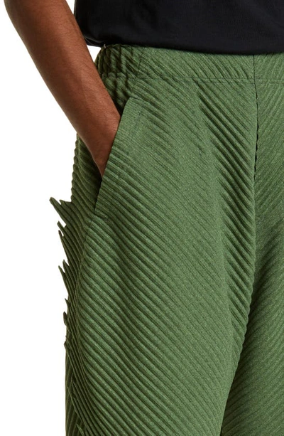 Shop Issey Miyake Serrate Pleated Pants In Green