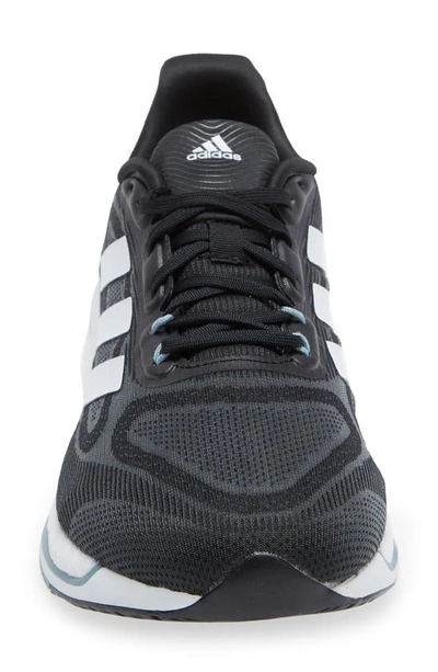 Shop Adidas Originals Supernova Running Shoe In Black/ White