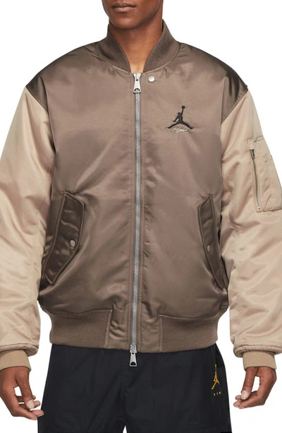 Shop Jordan Essentials Renegade Bomber Jacket In Palomino/ Desert/ Black