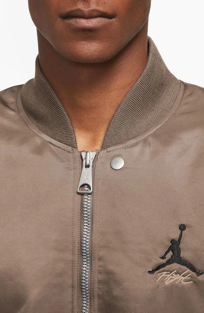 Shop Jordan Essentials Renegade Bomber Jacket In Palomino/ Desert/ Black