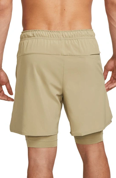 Shop Nike Dri-fit Unlimited 2-in-1 Versatile Shorts In Neutral Olive
