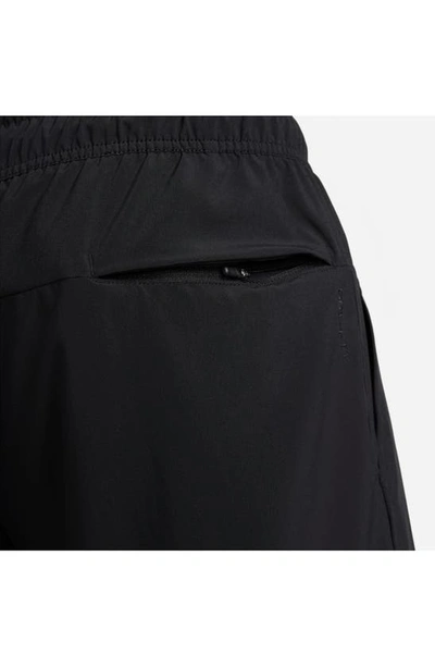 Shop Nike Dri-fit Unlimited 2-in-1 Versatile Shorts In Black/ Black/ Black/ Black