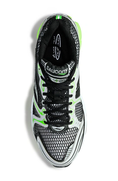 Shop Saucony Progrid Triumph 4 Running Shoe In Black/ Silver