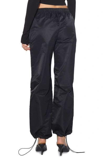 Shop Something New Eco Recycled Nylon Track Pants In Black