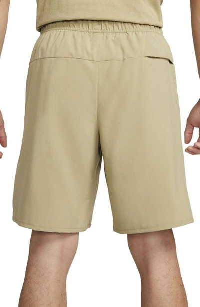 Nike Men's Unlimited Dri-fit 9" Unlined Versatile Shorts In Olive/ Black/ Neutral Olive