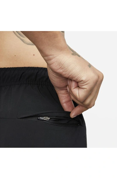 Shop Nike Dri-fit Unlimited Training Shorts In Black/ Black/ Black