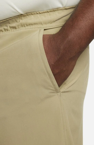 Nike Men's Unlimited Dri-fit 9" Unlined Versatile Shorts In Olive/ Black/ Neutral Olive