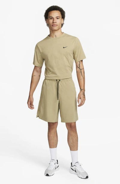 Shop Nike Dri-fit Unlimited Training Shorts In Olive/ Black/ Neutral Olive