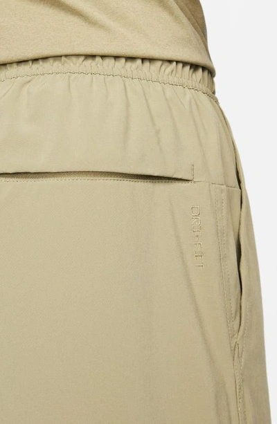 Shop Nike Dri-fit Unlimited Training Shorts In Olive/ Black/ Neutral Olive