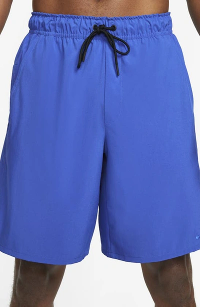 Shop Nike Dri-fit Unlimited Training Shorts In Game Royal/ Black/ Game Royal