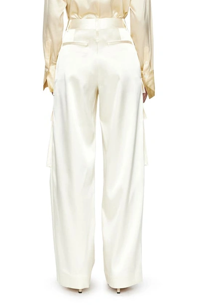 Shop Frame Relaxed Fit Straight Leg Satin Cargo Pants In Bone