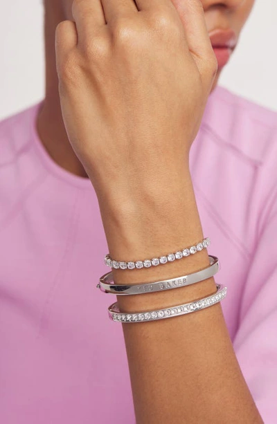 Shop Ted Baker Melrah Icon Crystal Slider Tennis Bracelet In Silver Tone Clear Crystal