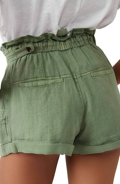 Shop Free People Topanga Paperbag Waist Cuff Hem Linen & Cotton Shorts In Oil Green