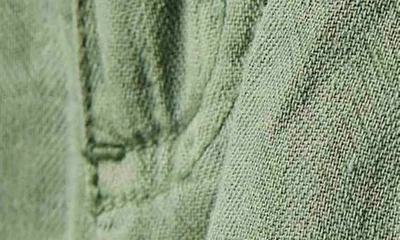 Shop Free People Topanga Paperbag Waist Cuff Hem Linen & Cotton Shorts In Oil Green