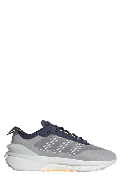 Shop Adidas Originals Gender Inclusive Avryn Sneaker In Shadow Navy/ Acid Orange