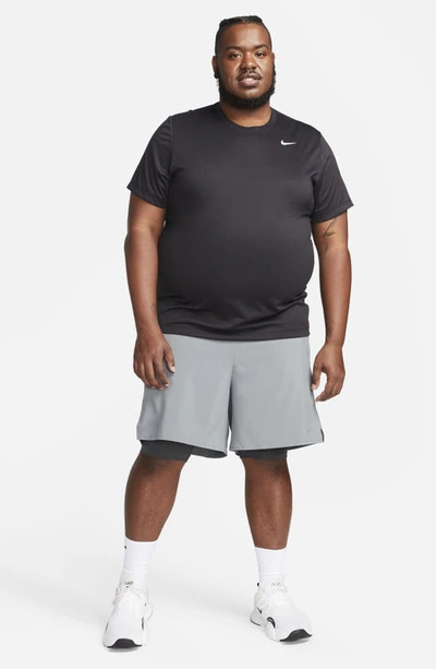 Shop Nike Dri-fit Unlimited 2-in-1 Versatile Shorts In Dark Smoke Grey/ Black