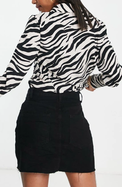 Shop Asos Design Original Raw Hem Denim Miniskirt In Black