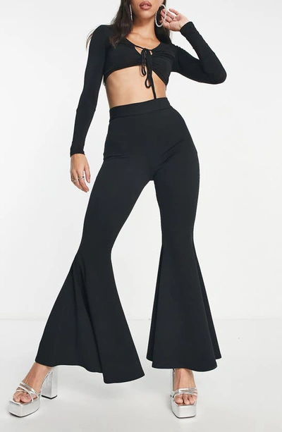 Missguided flare trousers in black, ASOS