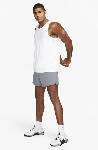 Shop Nike Dri-fit Primary Training Tank In White/ White