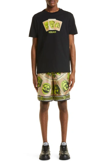 Versace Masks Knee Length Graphic Print Shorts In Acid Green/ Moonstruck