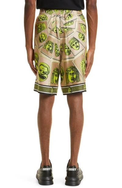 Shop Versace Masks Print Silk Shorts In Acid Green/ Moonstruck