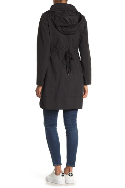 Shop Cole Haan Packable Hooded Rain Jacket In Black