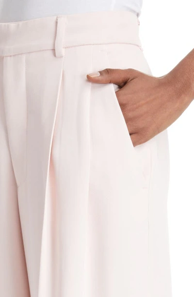 Shop Amiri Double Pleated Pants In Pink