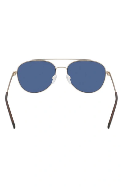 Shop Converse Activate 57mm Aviator Sunglasses In Satin Gold / Blue