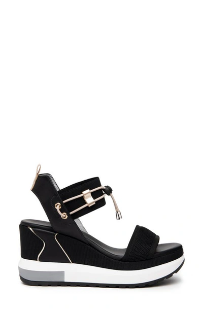 Shop Nerogiardini Bungee Platform Wedge Sandal In Black