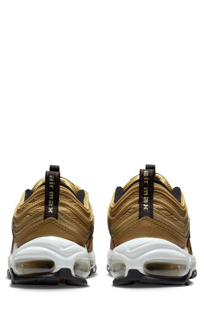 Shop Nike Air Max 97 Sneaker In Metallic Gold/ Red/ Black