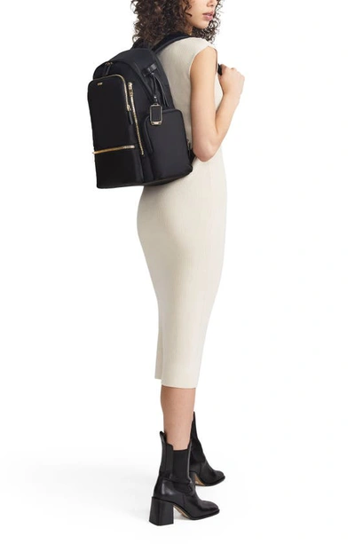 Shop Tumi Celina Backpack In Black/ Gold