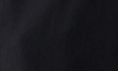 A Pea In The Pod Smocked Long Sleeve Maternity Peplum In Black