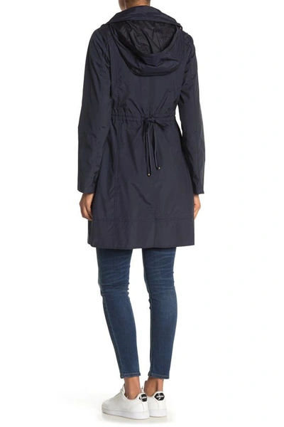Shop Cole Haan Packable Hooded Rain Jacket In Indigo