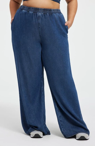 Shop Good American Weightless Pull-on Wide Leg Track Pants In Indigo395