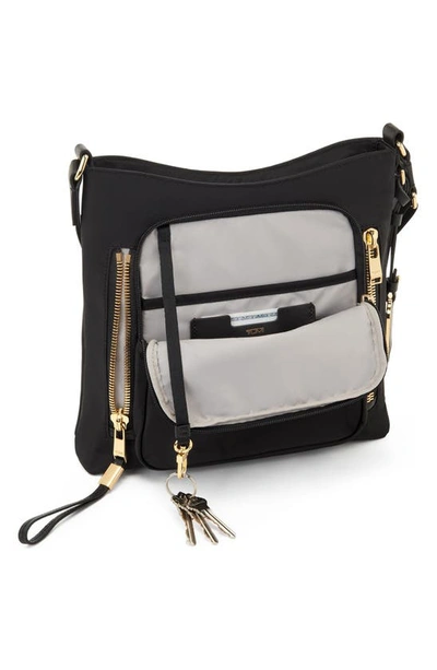 Shop Tumi Tyler Crossbody Bag In Black/ Gold