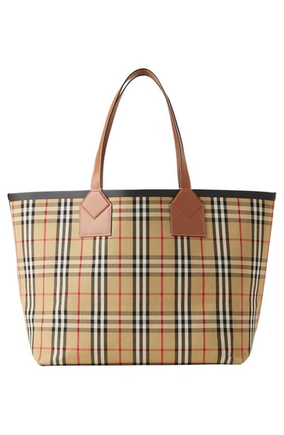Shop Burberry Large London Check Cotton Canvas Tote In Briar Brown/ Black