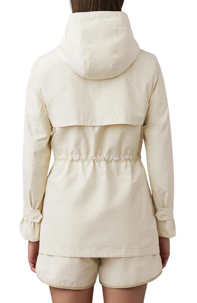 Shop Mackage Melany Hooded Rain Jacket In Cream