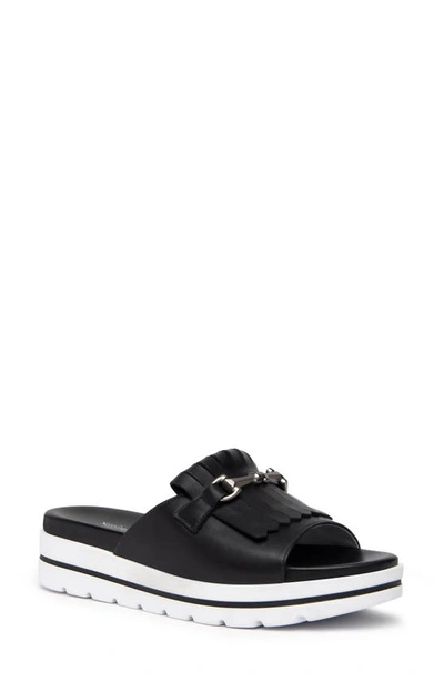 Shop Nerogiardini Horsebit Kiltie Slide Sandal In Black