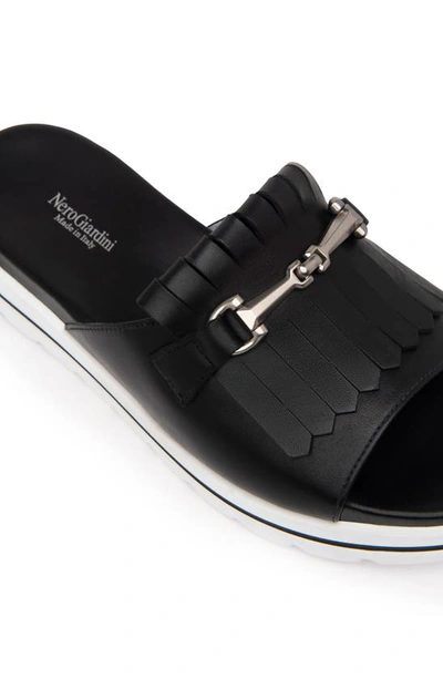 Shop Nerogiardini Horsebit Kiltie Slide Sandal In Black