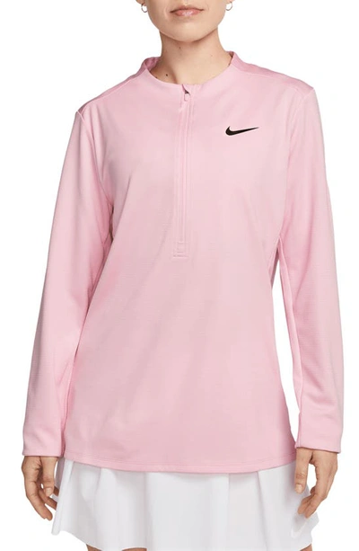 Shop Nike Dri-fit Uv Advantage Half Zip Pullover In Medium Soft Pink/ Black