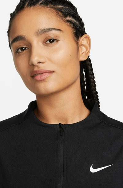 Shop Nike Dri-fit Uv Advantage Half Zip Pullover In Black/ White