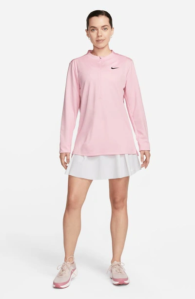 Shop Nike Dri-fit Uv Advantage Half Zip Pullover In Medium Soft Pink/ Black