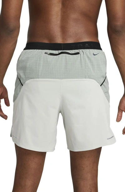 Shop Nike Dri-fit Trail Running Shorts In Silver/ Green/ Black